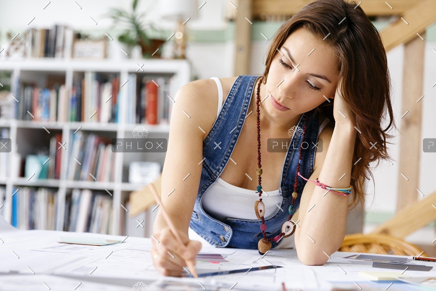 demo-attachment-169-young-pretty-woman-at-her-desk-PDDLFRL